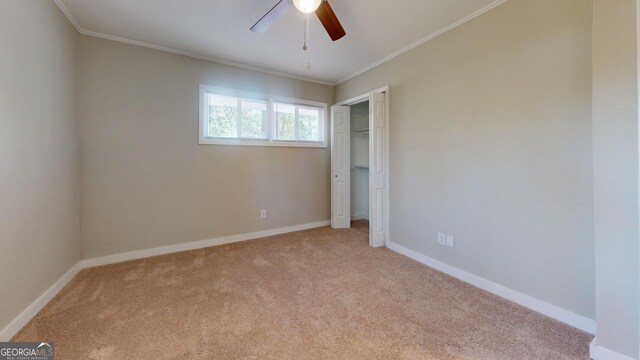 2280 Raleigh Dr, Augusta, GA 30904 - unfurnished bedroom featuring carpet flooring, baseboards, ornamental molding, and a closet