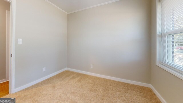 2280 Raleigh Dr, Augusta, GA 30904 - empty room with light carpet, ornamental molding, and baseboards