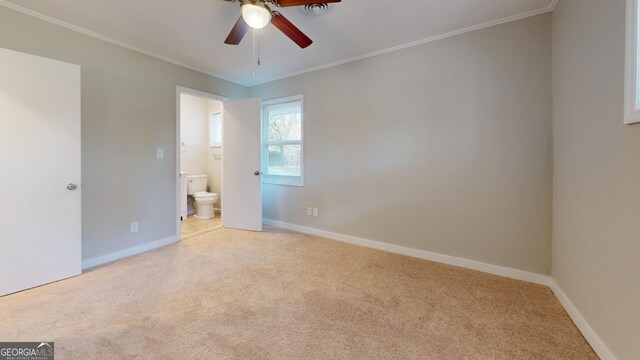 2280 Raleigh Dr, Augusta, GA 30904 - unfurnished bedroom with carpet floors, baseboards, ornamental molding, connected bathroom, and a ceiling fan