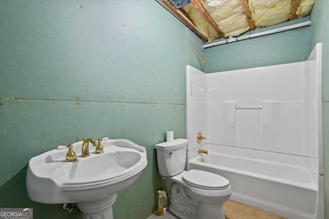 1253 Oakwood Pl, Loganville, GA 30052 - full bathroom with toilet, shower / washtub combination, and a sink