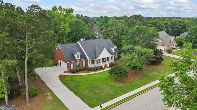 1253 Oakwood Pl, Loganville, GA 30052 - view from above of property with a forest
