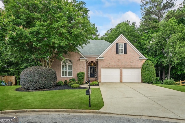1444 Merrifield Ln, Marietta, GA 30062 - traditional-style home featuring concrete driveway, brick siding, and an attached garage