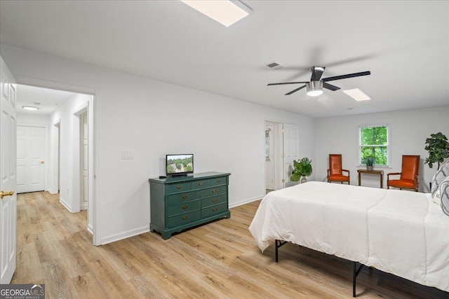 1444 Merrifield Ln, Marietta, GA 30062 - bedroom with light wood-style floors, baseboards, and a ceiling fan
