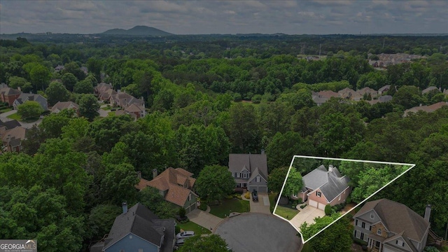 1444 Merrifield Ln, Marietta, GA 30062 - aerial perspective of suburban area featuring a forest and property parcel outlined