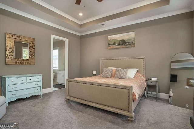 1325 Silo Bnd, Watkinsville, GA 30677 - carpeted bedroom featuring a raised ceiling, ornamental molding, recessed lighting, ensuite bath, and baseboards