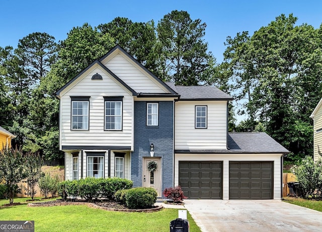 1075 Litchfield Way SW, Marietta, GA 30060 - view of front of property featuring concrete driveway, a front lawn, a garage, and brick siding