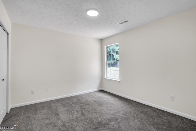 1075 Litchfield Way SW, Marietta, GA 30060 - unfurnished room featuring carpet, a textured ceiling, and baseboards