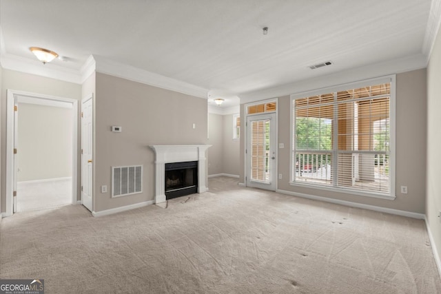 426 Pembrooke Cir Unit 426, Alpharetta, GA 30004 - unfurnished living room featuring carpet, crown molding, and a fireplace with flush hearth