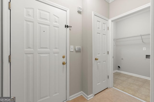 426 Pembrooke Cir Unit 426, Alpharetta, GA 30004 - laundry area with hookup for an electric dryer and light tile patterned flooring