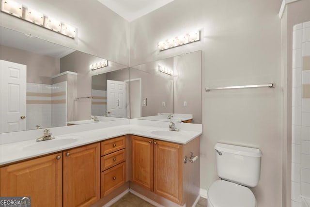 426 Pembrooke Cir Unit 426, Alpharetta, GA 30004 - full bathroom featuring double vanity, tiled shower, and tile patterned flooring