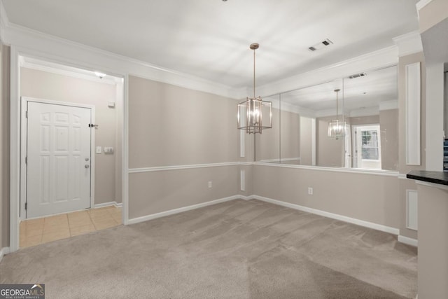 426 Pembrooke Cir Unit 426, Alpharetta, GA 30004 - unfurnished dining area featuring carpet flooring, crown molding, and a chandelier