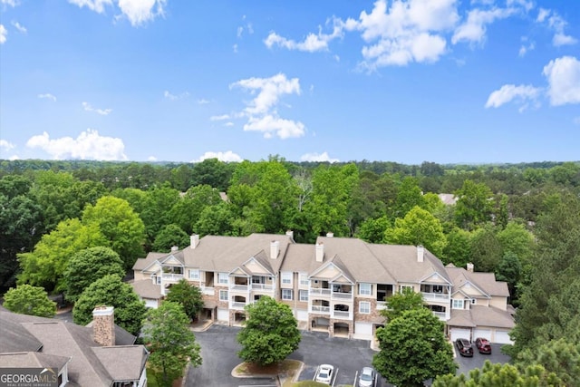 426 Pembrooke Cir Unit 426, Alpharetta, GA 30004 - aerial perspective of suburban area with a forest