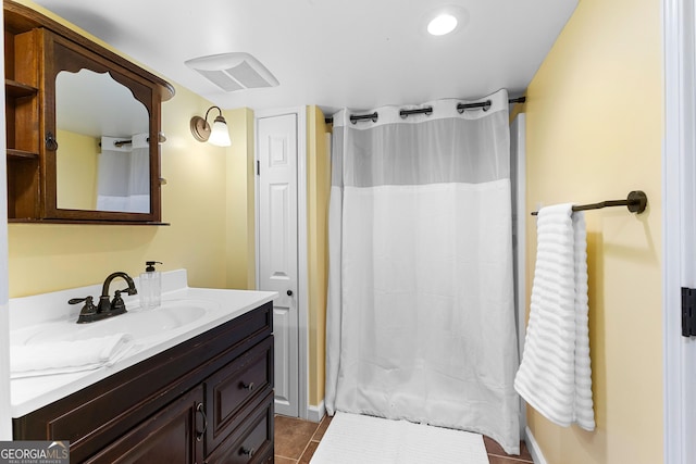 full bathroom with vanity and a shower with curtain