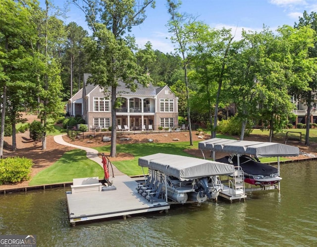 1230 Armor Pt, Greensboro, GA 30642 - dock area featuring boat lift, a water view, and a lawn