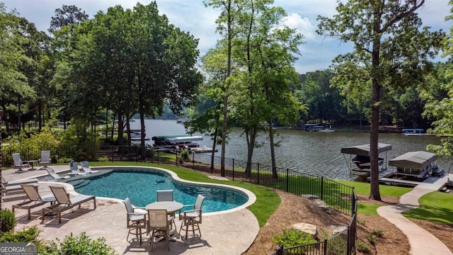 1230 Armor Pt, Greensboro, GA 30642 - view of swimming pool with a boat dock, a patio, a water view, and boat lift