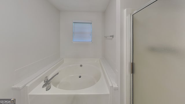 200 Compton Ct, Mcdonough, GA 30252 - bathroom featuring a garden tub and a stall shower