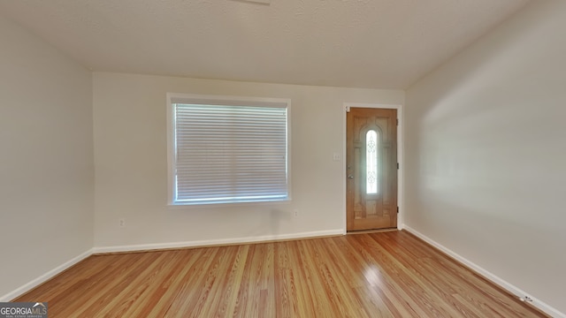200 Compton Ct, Mcdonough, GA 30252 - foyer featuring light wood-style flooring and baseboards