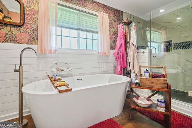 3839 Brookcrest Cir, Decatur, GA 30032 - bathroom featuring wallpapered walls, a marble finish shower, a soaking tub, a wainscoted wall, and tile walls
