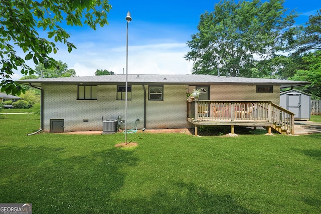 3839 Brookcrest Cir, Decatur, GA 30032 - rear view of property featuring a shed, brick siding, a deck, and a lawn