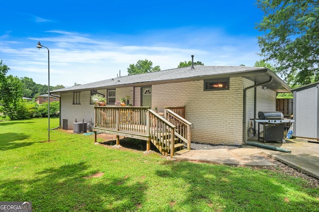 3839 Brookcrest Cir, Decatur, GA 30032 - back of property featuring brick siding and a lawn