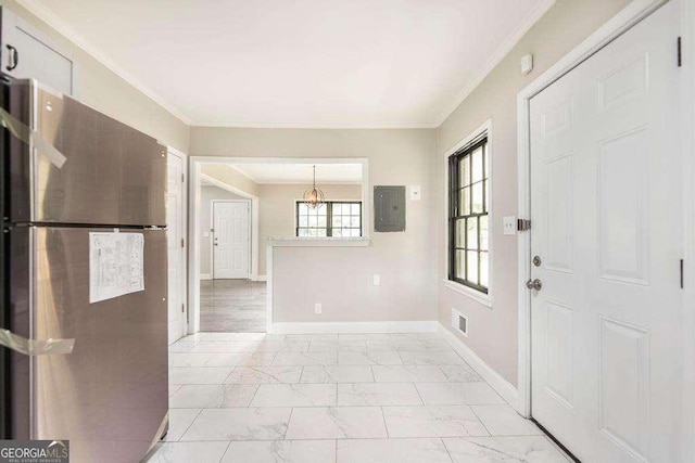 foyer featuring light marble finish flooring, a chandelier, crown molding, baseboards, and electric panel