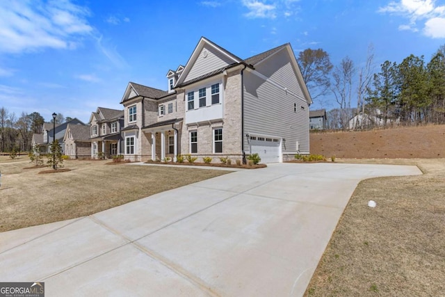 3390 Traditions Way, Jefferson, GA 30549 - view of front of property with driveway, a residential view, and an attached garage