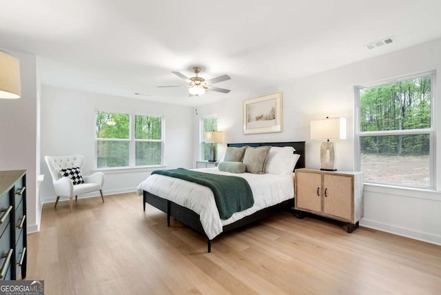 3390 Traditions Way, Jefferson, GA 30549 - bedroom featuring light wood finished floors, baseboards, and a ceiling fan