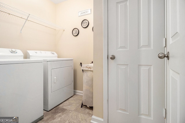 2555 Flat Shoals Rd Unit 1405, College Park, GA 30349 - washroom with independent washer and dryer and baseboards