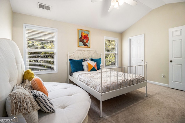 2555 Flat Shoals Rd Unit 1405, College Park, GA 30349 - bedroom with vaulted ceiling, carpet flooring, baseboards, and ceiling fan