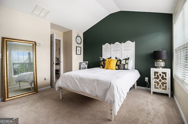 2555 Flat Shoals Rd Unit 1405, College Park, GA 30349 - carpeted bedroom with lofted ceiling and baseboards