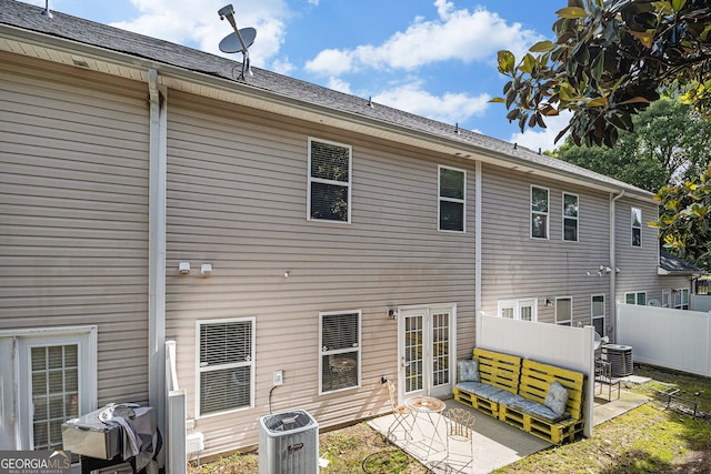 2555 Flat Shoals Rd Unit 1405, College Park, GA 30349 - rear view of property with central air condition unit and a patio area
