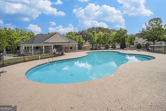 2555 Flat Shoals Rd Unit 1405, College Park, GA 30349 - community pool with a patio