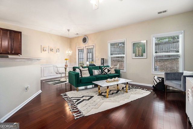 2555 Flat Shoals Rd Unit 1405, College Park, GA 30349 - living room featuring a chandelier, dark wood finished floors, and baseboards