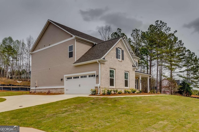 3354 Traditions Way, Jefferson, GA 30549 - view of side of property with concrete driveway, an attached garage, brick siding, and roof with shingles