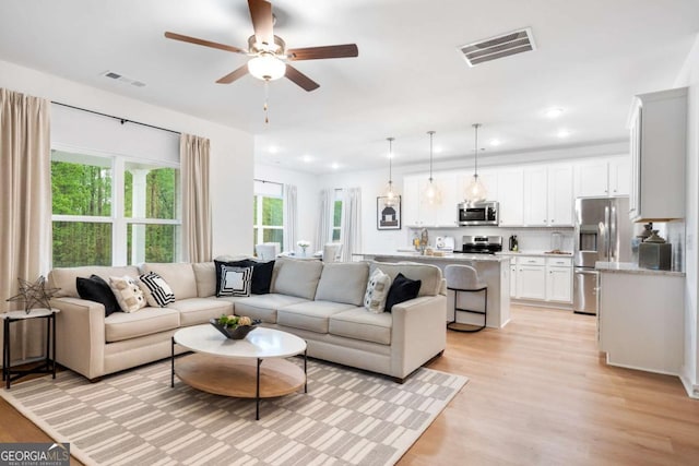 3354 Traditions Way, Jefferson, GA 30549 - living area with a ceiling fan, light wood finished floors, and recessed lighting