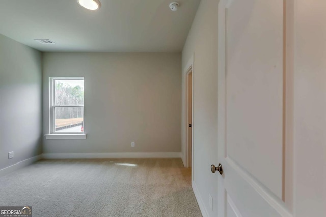 3354 Traditions Way, Jefferson, GA 30549 - empty room with light colored carpet, baseboards, and a smoke detector