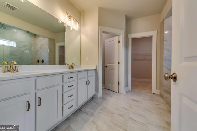3354 Traditions Way, Jefferson, GA 30549 - full bathroom with a marble finish shower, double vanity, a walk in closet, and marble finish flooring