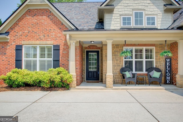 5220 Wild Cedar Dr, Buford, GA 30518 - entrance to property with covered porch and brick siding