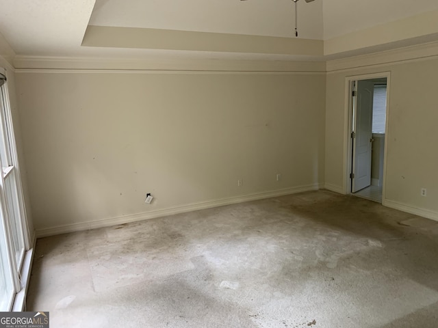 unfurnished room featuring baseboards, carpet flooring, and ceiling fan