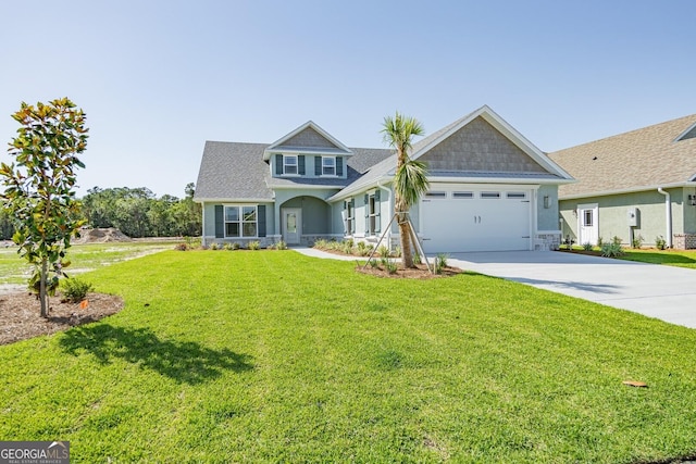 137 Amanda Trce, Kingsland, GA 31548 - view of front of house featuring concrete driveway, an attached garage, a front lawn, and roof with shingles