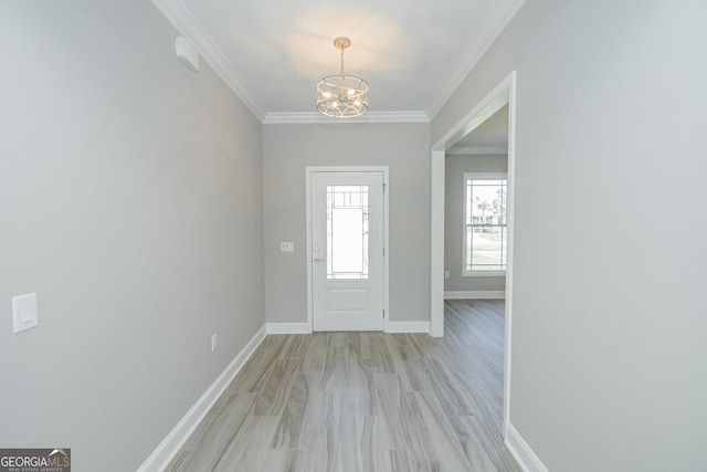 137 Amanda Trce, Kingsland, GA 31548 - entryway with a chandelier, ornamental molding, baseboards, and light wood-style flooring