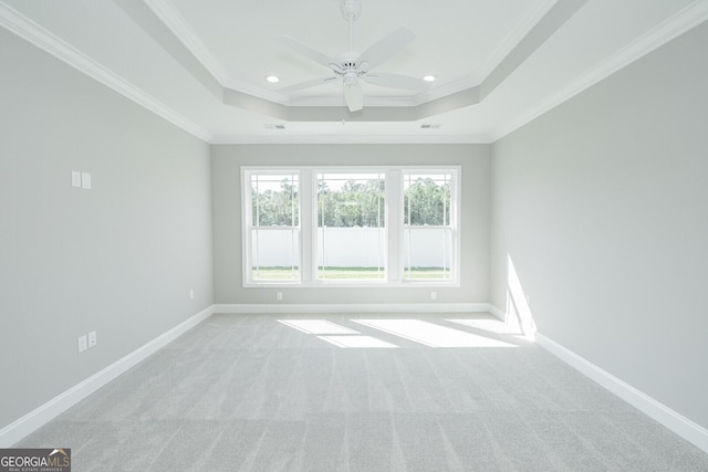 137 Amanda Trce, Kingsland, GA 31548 - empty room featuring carpet flooring, crown molding, ceiling fan, a tray ceiling, and recessed lighting