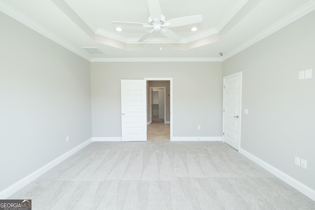 137 Amanda Trce, Kingsland, GA 31548 - unfurnished bedroom featuring a raised ceiling, crown molding, light colored carpet, baseboards, and recessed lighting
