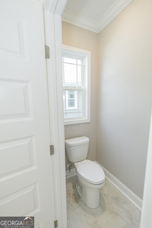 137 Amanda Trce, Kingsland, GA 31548 - bathroom with crown molding, toilet, and baseboards