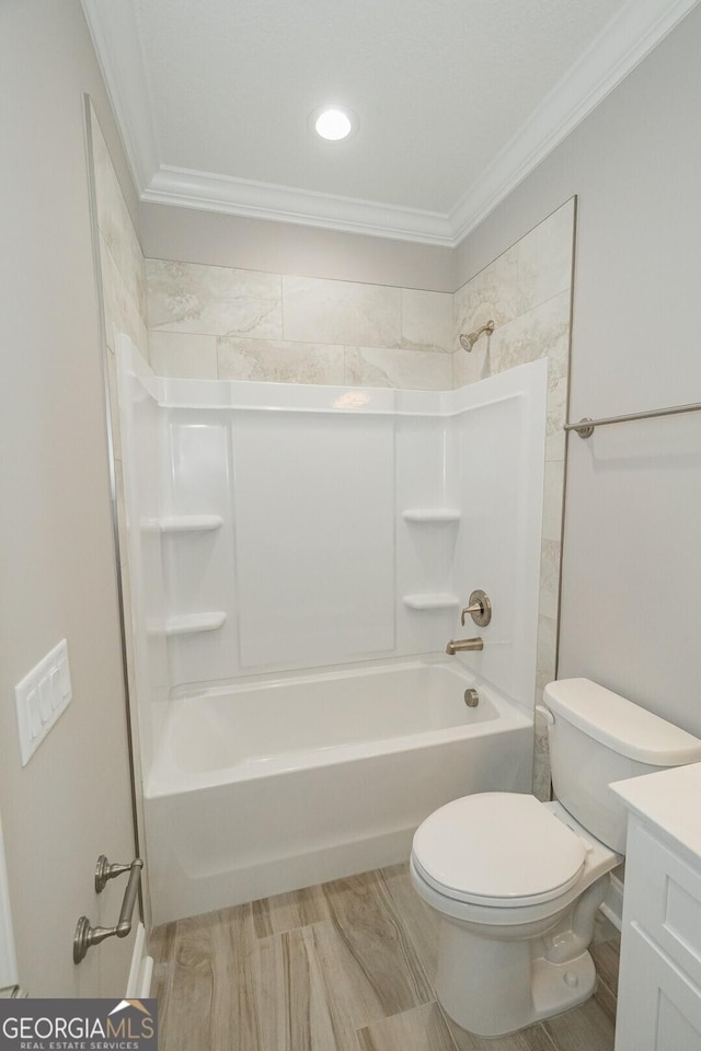 137 Amanda Trce, Kingsland, GA 31548 - bathroom with crown molding, toilet, vanity, and  shower combination