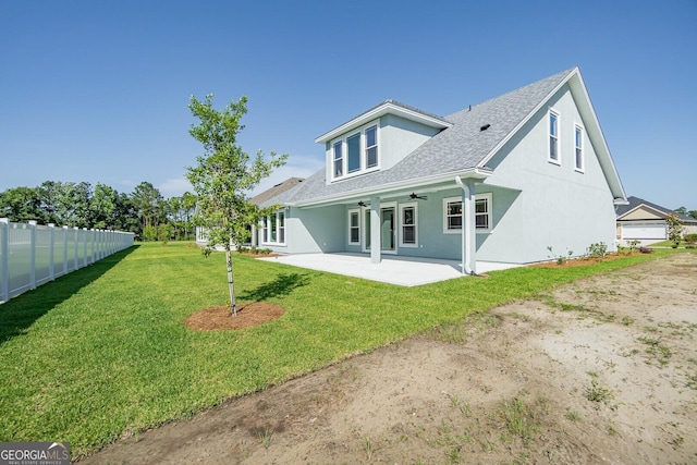 137 Amanda Trce, Kingsland, GA 31548 - back of house featuring a patio area, a ceiling fan, a shingled roof, and stucco siding