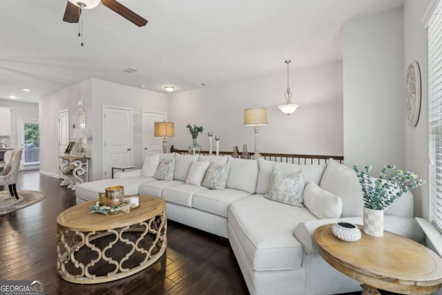 living room featuring ceiling fan, dark wood-style flooring, and recessed lighting