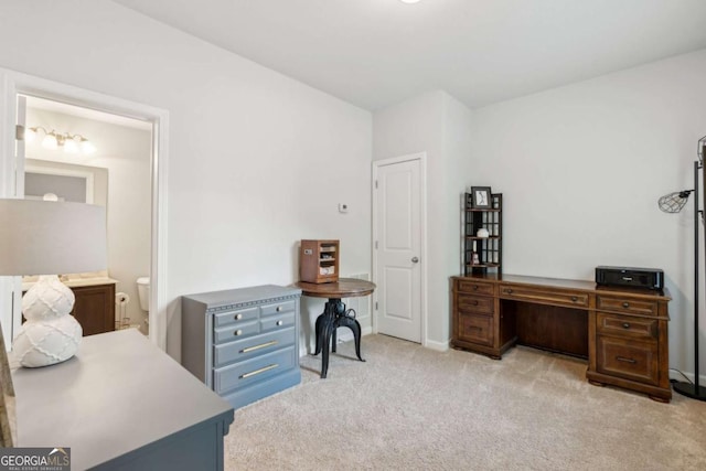 office area with light colored carpet