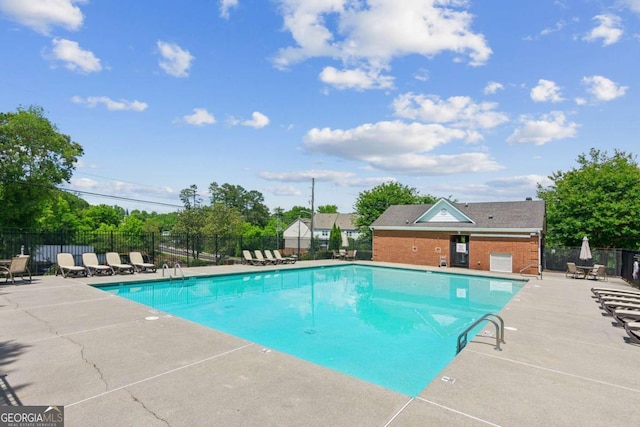 community pool featuring a patio area