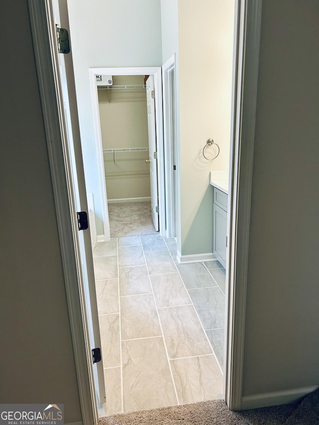 6605 New Ridge Ct, Cumming, GA 30041 - bathroom featuring baseboards and vanity